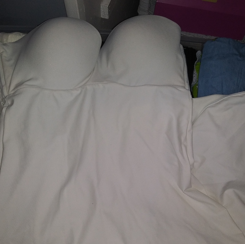 Ivory Size 34C ankle length under garmet.